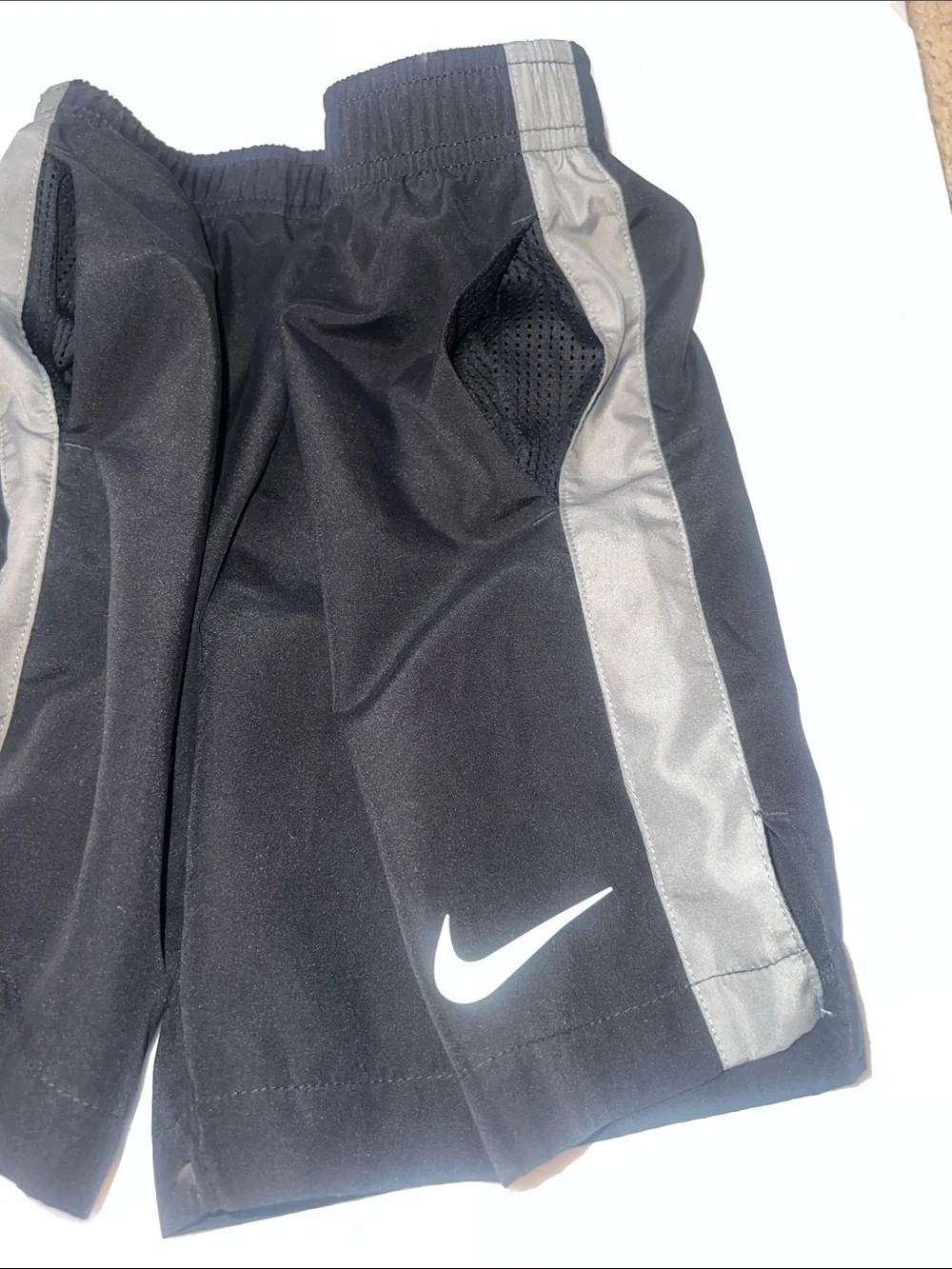 Nike Black Shorts with Gray Side Panels and White Swoosh